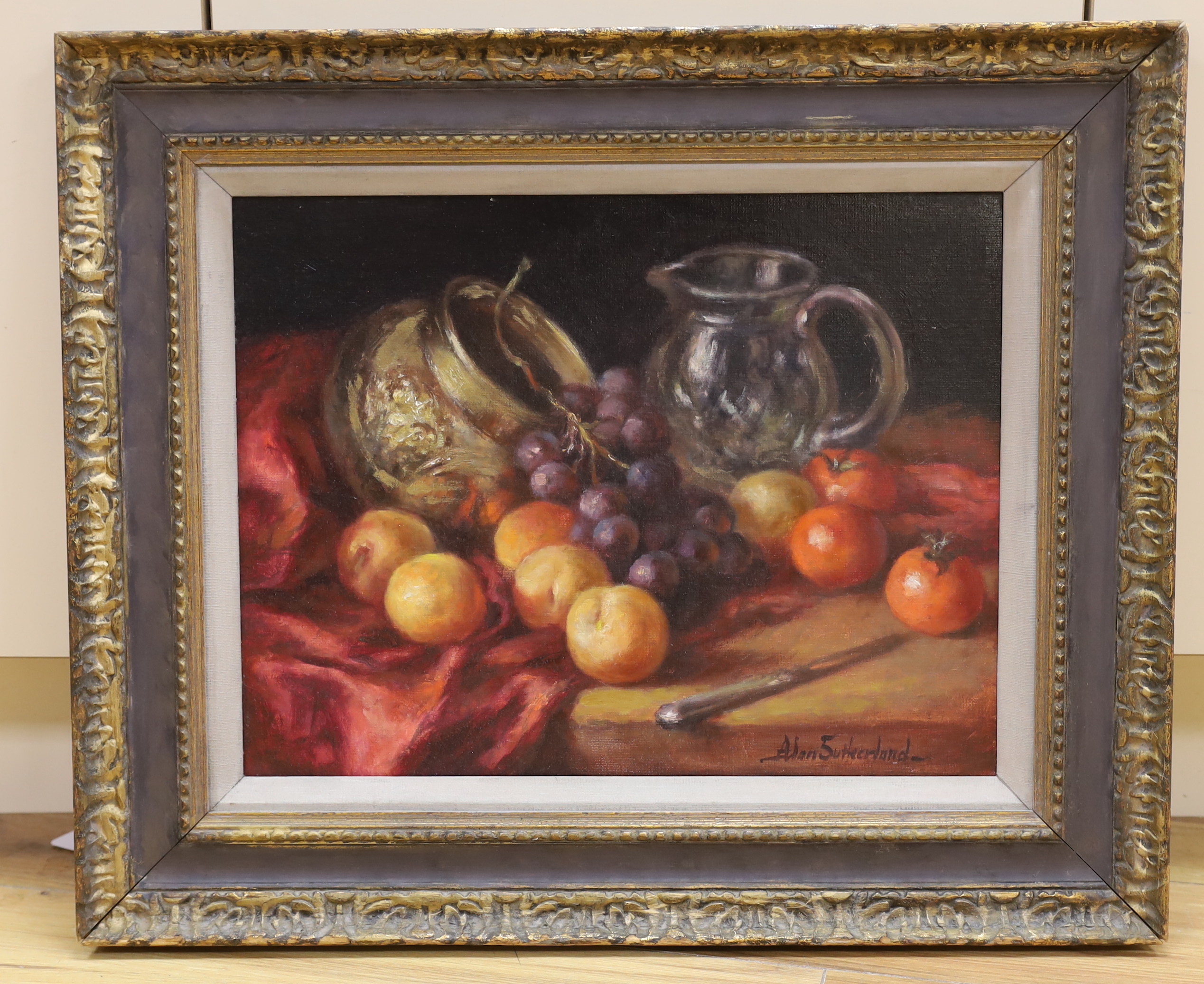 Alan Sutherland (1931-2019), oil on board, Still life of fruit on a table top, signed, 34 x 44cm